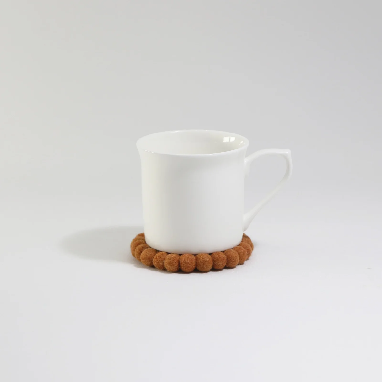 Brown Round Felt Tea Coasters – Handmade, Durable & Eco-Friendly